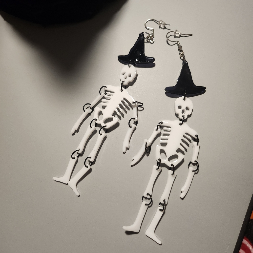 Dangling skeleton resin earrings